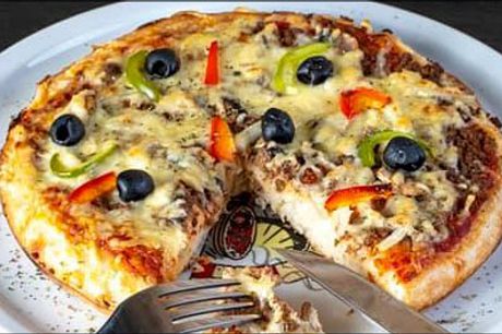  Prøv de lækre pizzaer fra Restaurant Viva.. - Tid til takeaway - Valgfri deep pan pizza - ca. 32 cm. til en værdi af kr. 135,- 