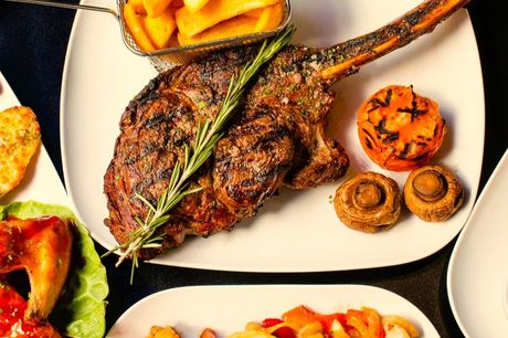 £29 instead of £47.90 for a steak dining for two people at Manhattan Bar and Grill, Liverpool including a glass of wine each - save 39%